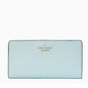 Kate Spade darcy large slim bifold wallet
BLUE GLOW